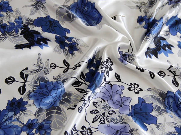 Floral fabric with blue flowers on a white background