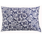 Floral patterned pillowcase with blue and white design on a white background
