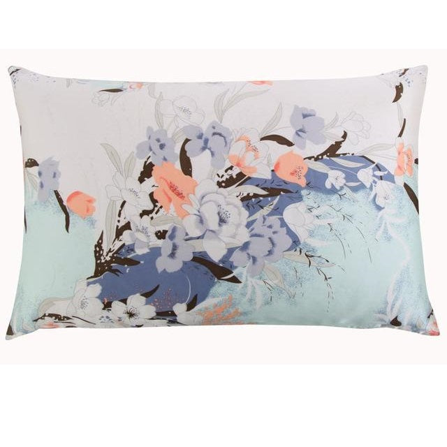Floral patterned pillow on a white background