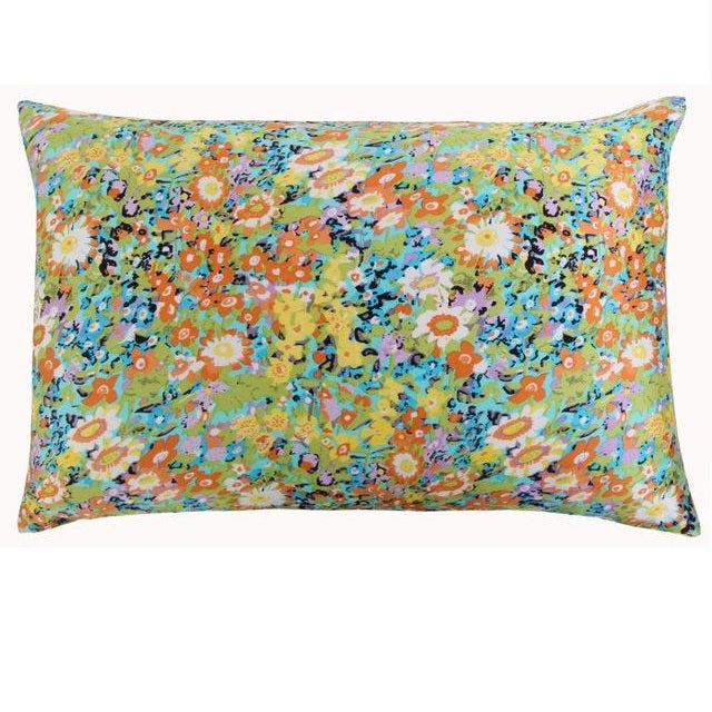 Floral patterned pillow on a white background