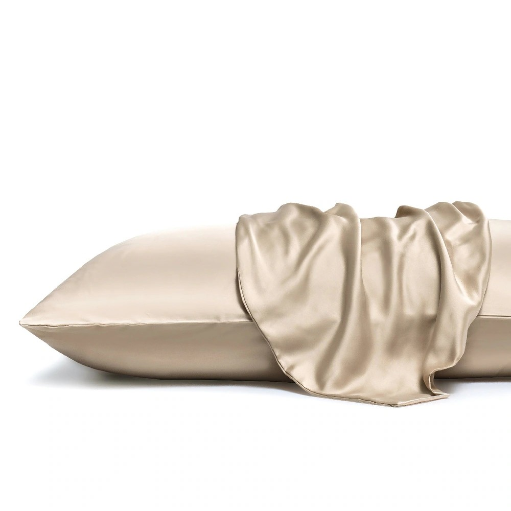 Beige satin pillowcase draped over a pillow on a white background
