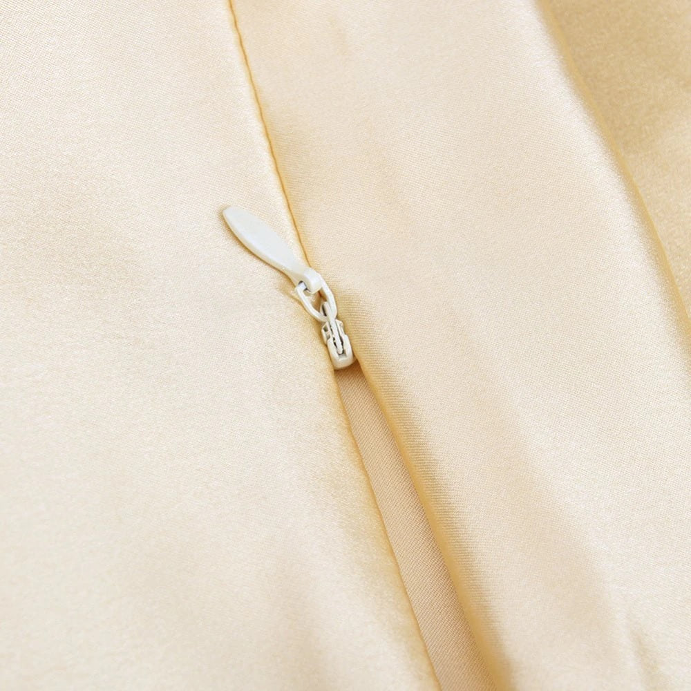 Close-up of a beige fabric with a zipper