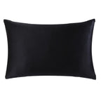 Black satin pillow on a white background