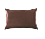 Brown satin pillow on a white background