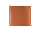 Brown leather pillow on a white background