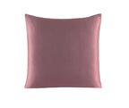 Pink satin pillow on a white background