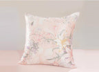 Floral patterned pillow on a light background