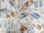 Floral fabric with colorful flowers and leaves on a white background