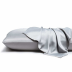 Silky pillowcase draped over a pillow on a white background