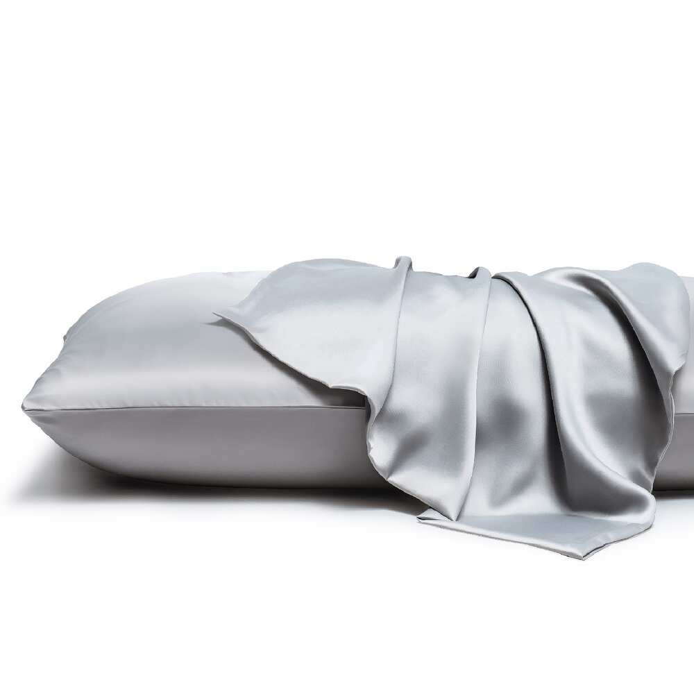 Silky pillowcase draped over a pillow on a white background