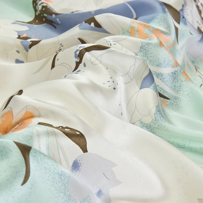 Silky fabric with a floral pattern in soft colors